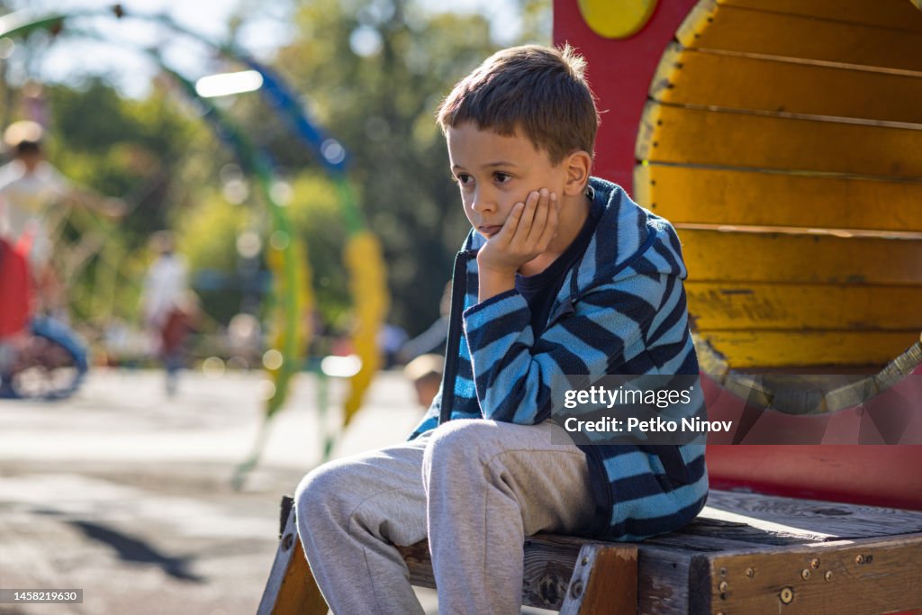 Sad boy at the playground