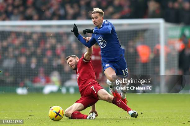 James Milner of Liverpool battles for possession with Mykhailo Mudryk of Chelsea during the Premier League match between Liverpool FC and Chelsea FC...