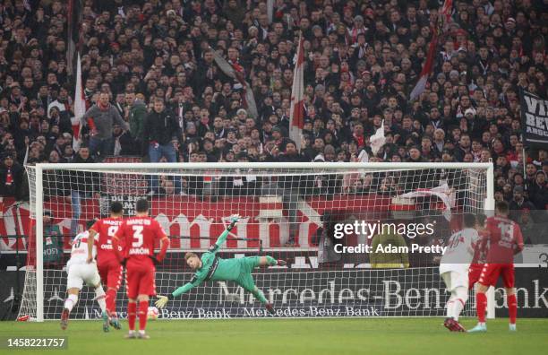 Marcus Ingvartsen of 1.FSV Mainz 05 scores the team's first goal from a penalty as Finn Dahmen of 1.FSV Mainz 05 attempts to make a save during the...