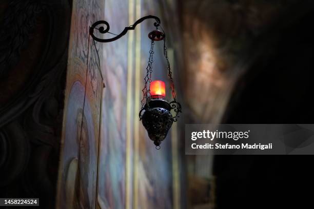 Red Lampion With Hanging Candle In Church, 照片檔