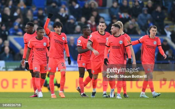 Kaoru Mitoma of Brighton & Hove Albion celebrates with teammates after scoring the team's first goal during the Premier League match between...