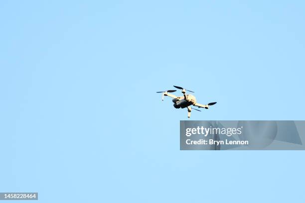 Drone is seen above the stadium, forcing the game to be paused during the Premier League match between Southampton FC and Aston Villa at Friends...