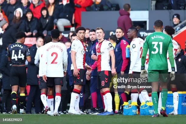 Players react after the game is paused due to a drone above the pitch during the Premier League match between Southampton FC and Aston Villa at...