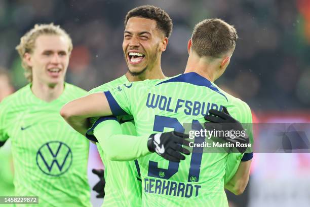 Yannick Gerhardt of VfL Wolfsburg celebrates after scoring the team's fourth goal with teammate Felix Nmecha during the Bundesliga match between VfL...