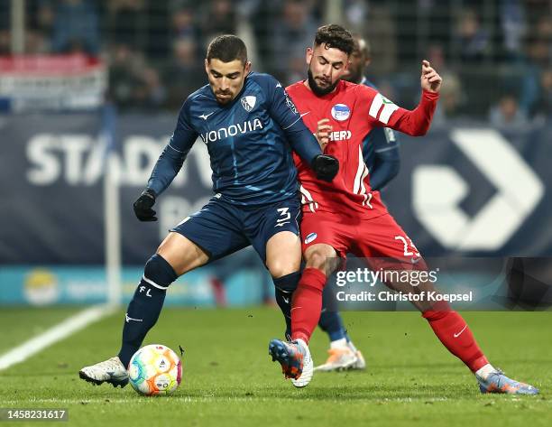 Danilo Soares of VfL Bochum is challenged by Marco Richter of Hertha BSC during the Bundesliga match between VfL Bochum 1848 and Hertha BSC at...