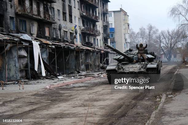 Ukrainian tank drives down a street in the heavily damaged town of Siversk which is situated near the front lines with Russia on January 21, 2023 in...