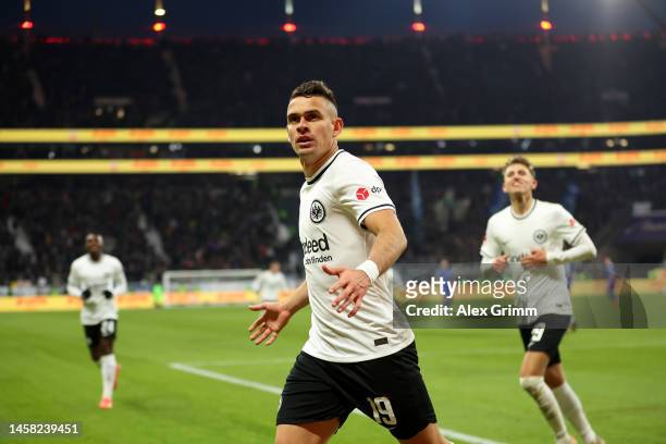 Rafael Santos Borre of Eintracht Frankfurt celebrates after Aurelio Buta scores the team's third goal during the Bundesliga match between Eintracht...