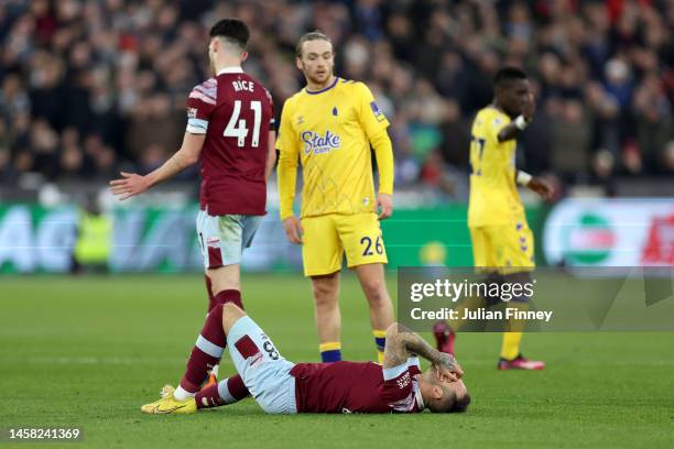 Danny Ings of West Ham United goes down with an injury during the Premier League match between West Ham United and Everton FC at London Stadium on...