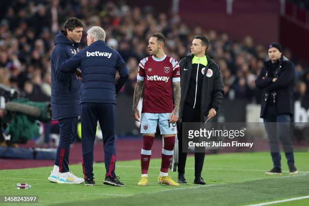 Danny Ings of West Ham United looks on before they are substituted on during the Premier League match between West Ham United and Everton FC at...