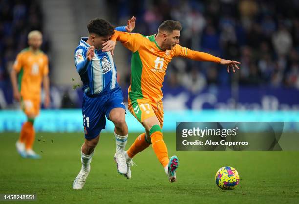 Nico Melamed of RCD Espanyol challenges Joaquin of Real Betis during the LaLiga Santander match between RCD Espanyol and Real Betis at RCDE Stadium...