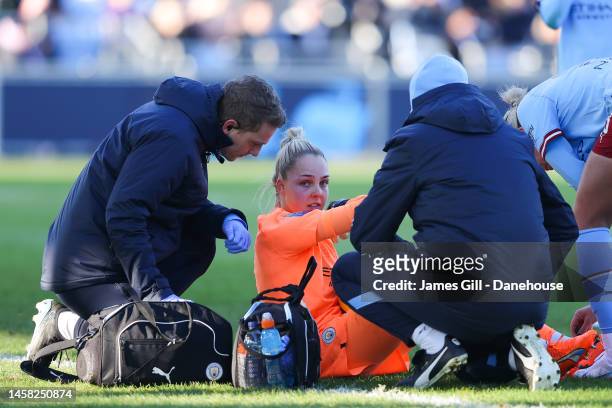 Ellie Roebuck of Manchester City receives treatment during the FA Women's Super League match between Manchester City and Aston Villa at The Academy...