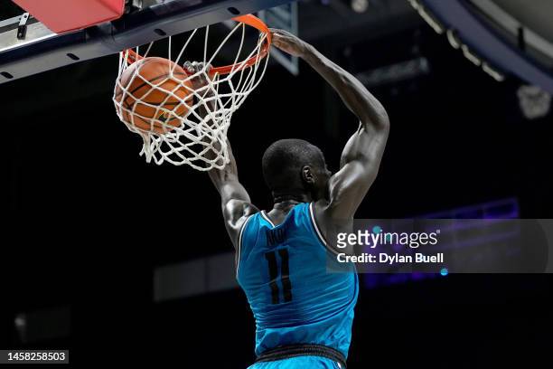 Akok Akok of the Georgetown Hoyas dunks the ball in the first half against the Xavier Musketeers at the Cintas Center on January 21, 2023 in...