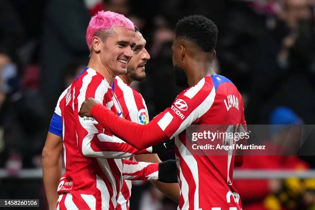 Antoine Griezmann of Atletico Madrid celebrates with teammates after scoring the team's second goal during the LaLiga Santander match between...