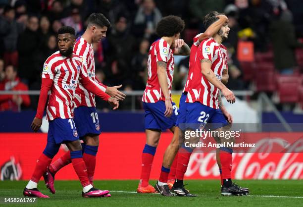 Mario Hermoso of Atletico Madrid celebrates with teammates after scoring the team's third goal during the LaLiga Santander match between Atletico de...