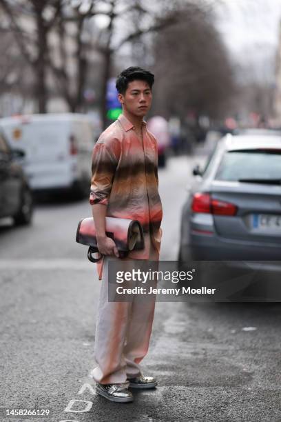 Fashion week guest seen wearing a total Paul Smith look before the Paul Smith show on January 20, 2023 in Paris, France.