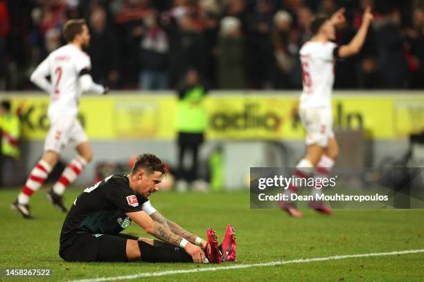 Marco Friedl of SV Werder Bremen reacts after Denis Huseinbasic of 1.FC Koln scored their sides fifth goal during the Bundesliga match between 1. FC...