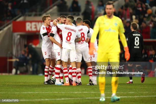 Steffen Tigges of 1.FC Koln celebrates after scoring the team's third goal during the Bundesliga match between 1. FC Köln and SV Werder Bremen at...