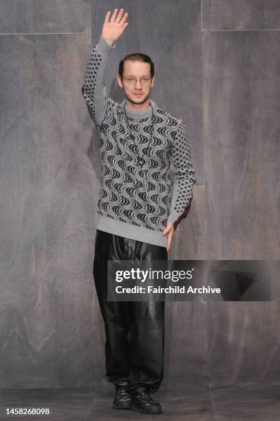 Fashion designer Damir Doma on the runway after his fall 2013 menswear show in salle Melpomene at Beaux Arts de Paris.