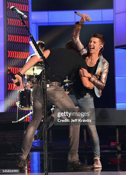 Charles Kelley of Lady Antebellum and Ryan Follese of Hot Chelle Rae perform onstage during the 2012 CMT Music awards at the Bridgestone Arena on...