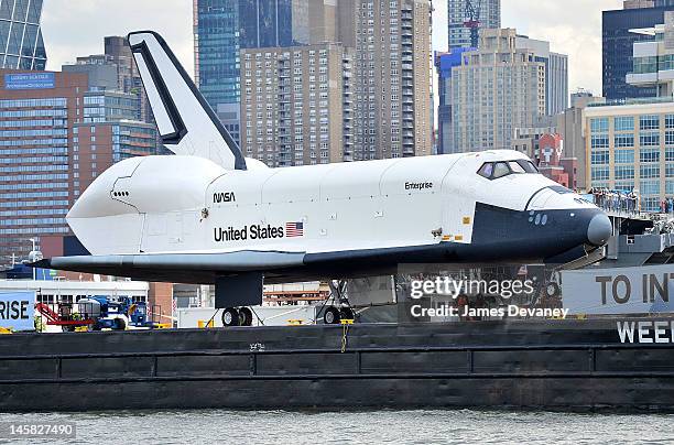 Space Shuttle Enterprise is transported to the Intrepid Sea, Air & Space Museum on June 6, 2012 in New York City.