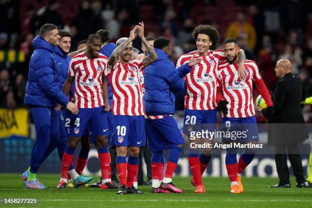 Axel Witsel and Memphis Depay of Atletico Madrid celebrate their side's victory after the LaLiga Santander match between Atletico de Madrid and Real...