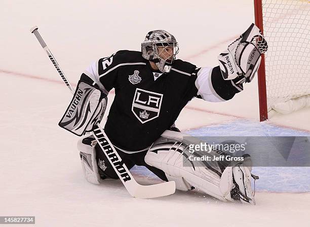 Goaltender Jonathan Quick of the Los Angeles Kings makes a save against New Jersey Devils during Game Four of the 2012 Stanley Cup Final at Staples...