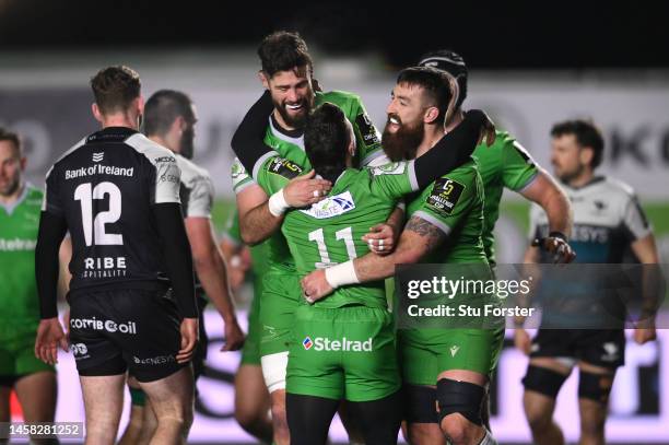 Falcons wing Mateo Carreras is congratulated by Gary Graham and Greg Peterson after scoring the third Falcons try during the Pool A Challenge Cup...