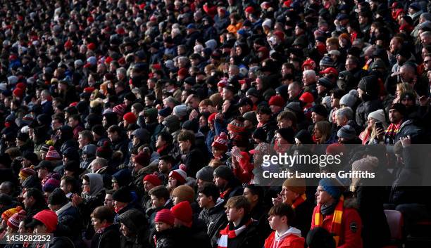 Liverpools fans watch the match during the Premier League match between Liverpool FC and Chelsea FC at Anfield on January 21, 2023 in Liverpool,...