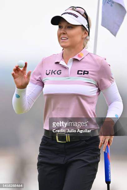 Brooke Henderson of Canada waves after her putt on the 18th hole during the third round of the Hilton Grand Vacations Tournament of Champions at Lake...