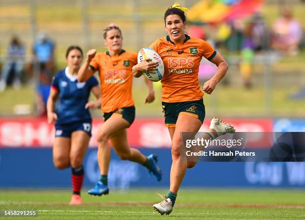 Charlotte Caslick of Australia makes a break during the 2023 HSBC Sevens match between Australia and Great Britain at FMG Stadium on January 22, 2023...