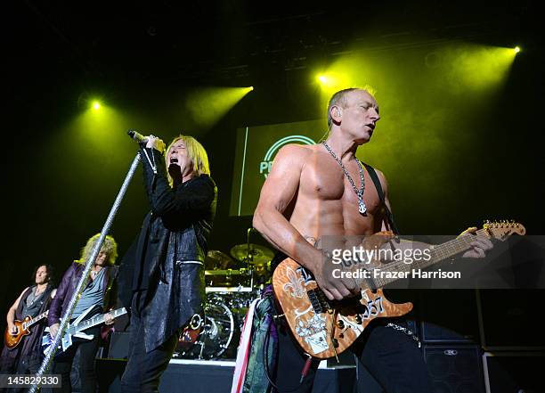 Def Leppard's Joe Elliott and Phil Collen perform at YouTube Presents Def Leppard At The House Of Blues at House of Blues Sunset Strip on June 6,...