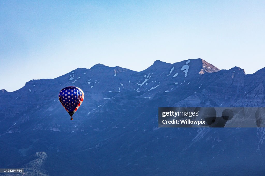USA Patriotic Red White and Blue Hot Air Balloon in Flight