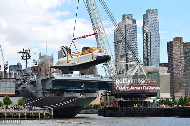 Space Shuttle Enterprise is transported to the Intrepid Sea, Air & Space Museum on June 6, 2012 in New York City.