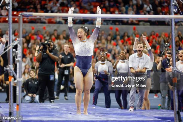 Sophia Groth of Auburn competes on the uneven bars during a meet against Arkansas at Neville Arena on January 20, 2023 in Auburn, Alabama.