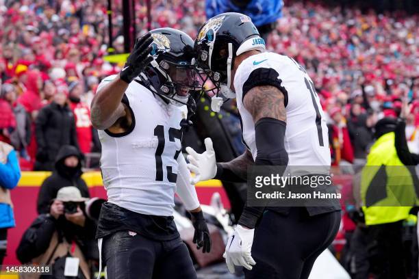Christian Kirk of the Jacksonville Jaguars celebrates with Evan Engram after scoring a 10 yard touchdown against the Kansas City Chiefs during the...