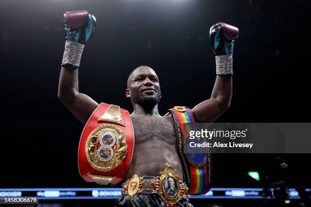 Ekow Essuman celebrates with their title belts after defeating Chris Kongo during the British, Commonwealth, IBF European and WBC International...