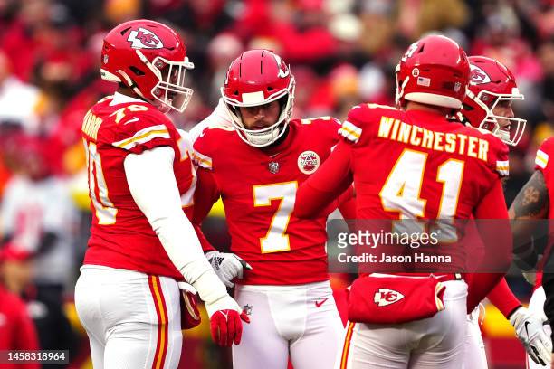 Harrison Butker of the Kansas City Chiefs celebrates with Prince Tega Wanogho and James Winchester after making a field goal against the Jacksonville...