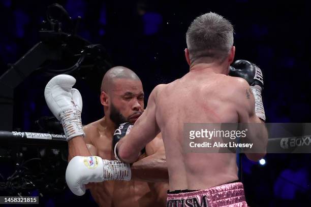 Liam Smith knocks down Chris Eubank Jr during the Middleweight fight between Chris Eubank Jr and Liam Smith at Manchester Arena on January 21, 2023...
