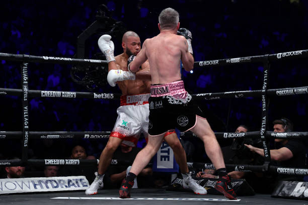 Liam Smith knocks down Chris Eubank Jr during the Middleweight fight between Chris Eubank Jr and Liam Smith at Manchester Arena on January 21, 2023...