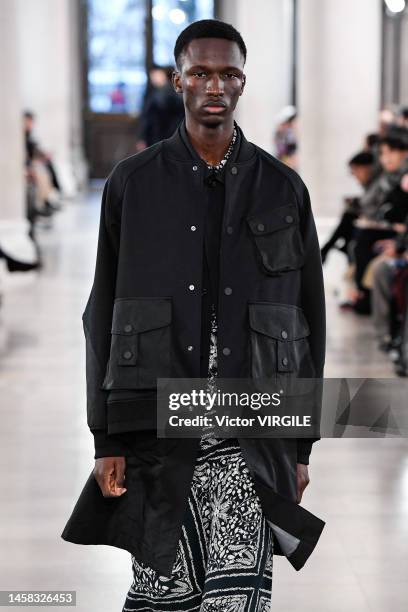 Model walks the runway during the White Mountaineering Ready to Wear Fall/Winter 2023-2024 fashion show as part of the Paris Men Fashion Week on...