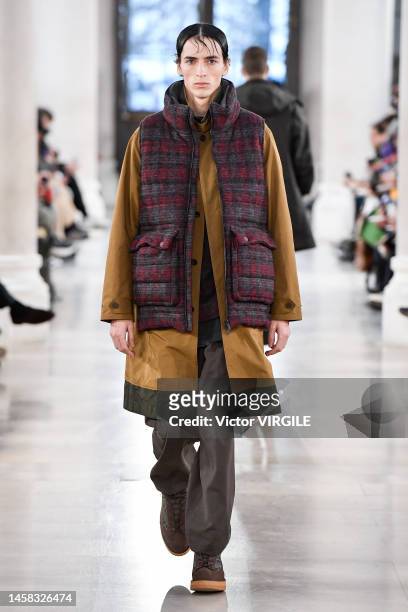 Model walks the runway during the White Mountaineering Ready to Wear Fall/Winter 2023-2024 fashion show as part of the Paris Men Fashion Week on...