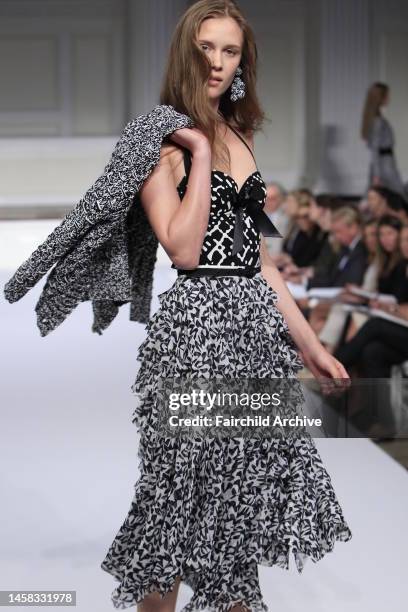 Model Marike Le Roux on the runway at Oscar de la Renta's resort 2011 show.