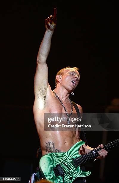 Def Leppard's Phil Collen performs at YouTube Presents Def Leppard At The House Of Blues at House of Blues Sunset Strip on June 6, 2012 in West...