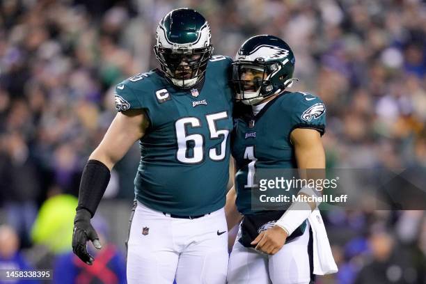 Lane Johnson and Jalen Hurts of the Philadelphia Eagles celebrate after a touchdown against the New York Giants during the first quarter in the NFC...