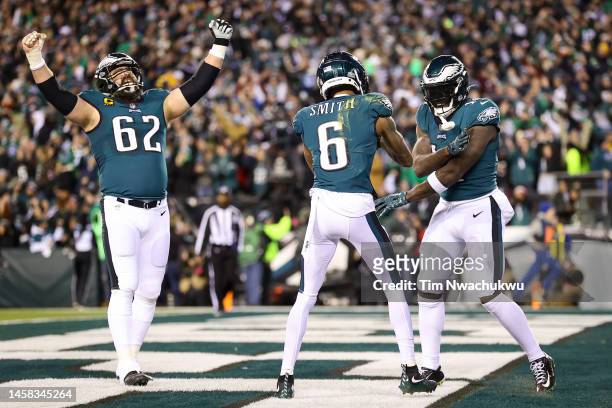 DeVonta Smith of the Philadelphia Eagles celebrates his touchdown with teammate A.J. Brown during the first quarter against the New York Giants in...