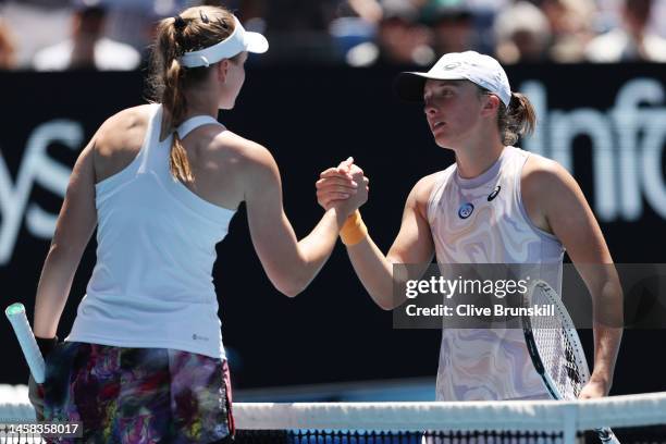 Elena Rybakina of Kazakhstan shakes hands with Iga Swiatek of Poland after winning the fourth round singles match during day seven of the 2023...