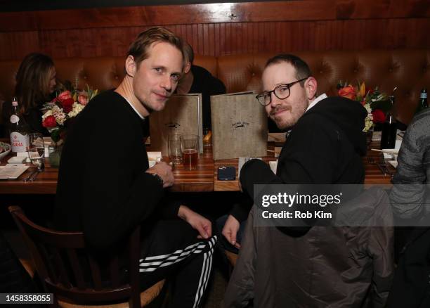 Alexander Skarsgard and Ari Aster attend Celebrate Sundance Dinner at Blind Dog Restaurant & Raw Bar on January 20, 2023 in Park City, Utah.