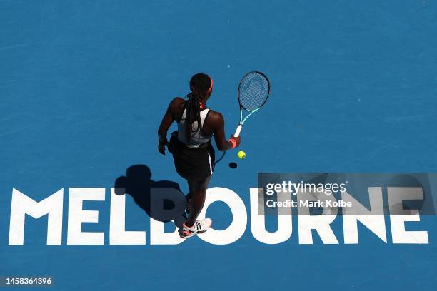 Coco Gauff of the United States prepares to serve during the fourth round singles match against Jelena Ostapenko of Latvia during day seven of the...