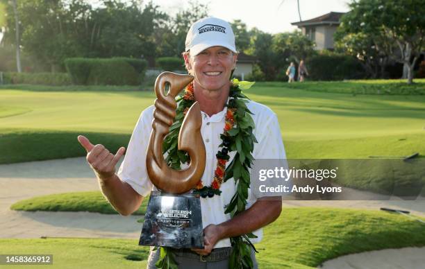 Steve Stricker holds the winner's trophy after winning the Mitsubishi Electric Championship at Hualalai at Hualalai Golf Club on January 21, 2023 in...