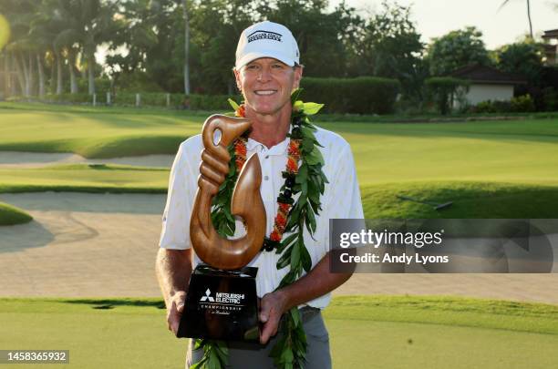 Steve Stricker holds the winner's trophy after winning the Mitsubishi Electric Championship at Hualalai at Hualalai Golf Club on January 21, 2023 in...